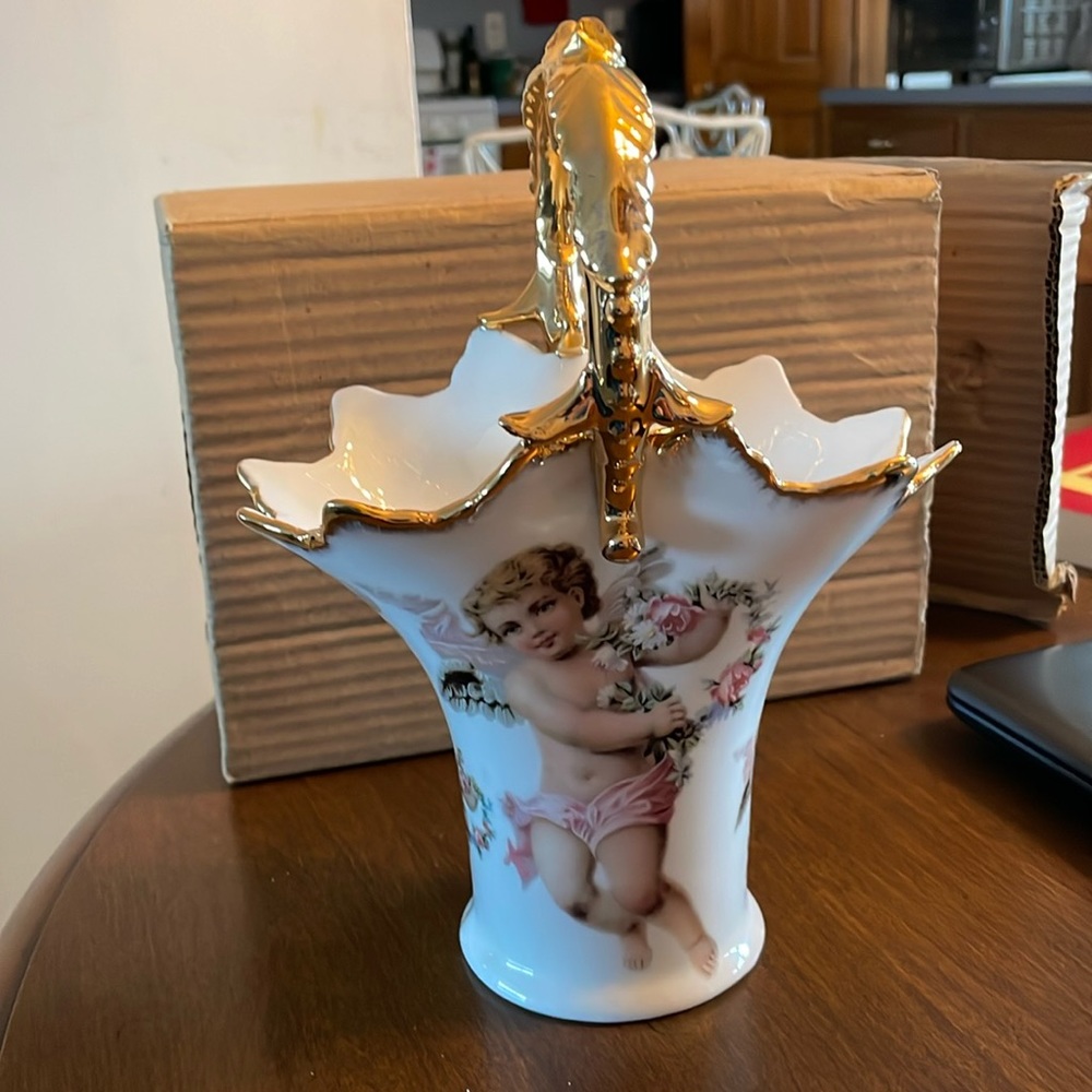 Porcelain cherub basket